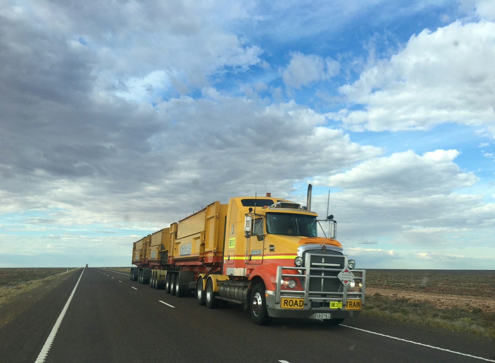 truck on highway during daytime commercial auto